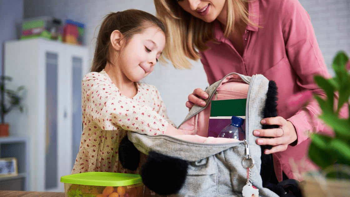 Packing an essentials bag with snacks and drinks