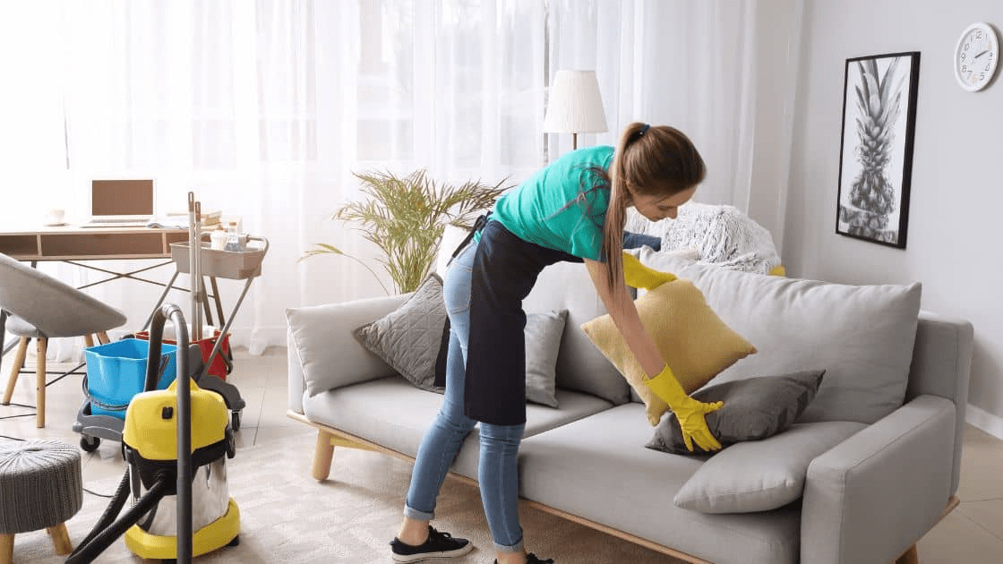 A person cleaning a room in preparation for moving day