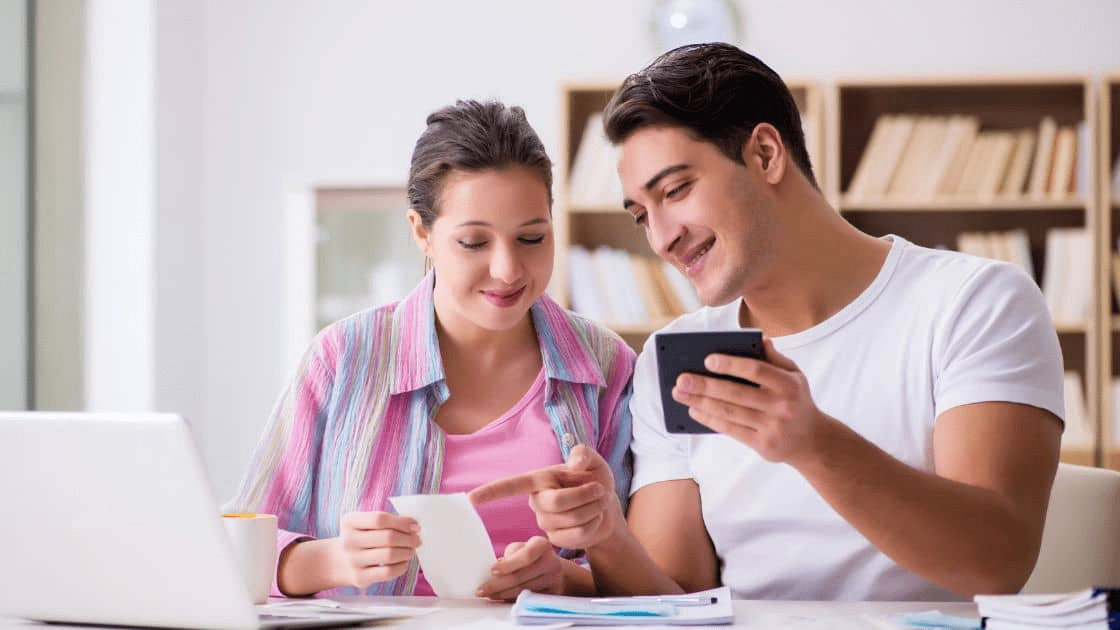 A family discussing their budget for a new house